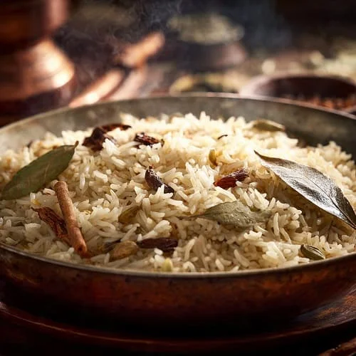 نتيجة رز كبسة مفلفل حبّة بحبّة بعد ضبط كمية الماء لكيلو رز